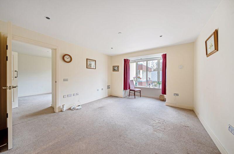 Living/dining room through to bedroom 2