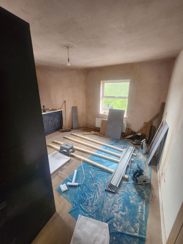 Room under renovation with natural light coming...