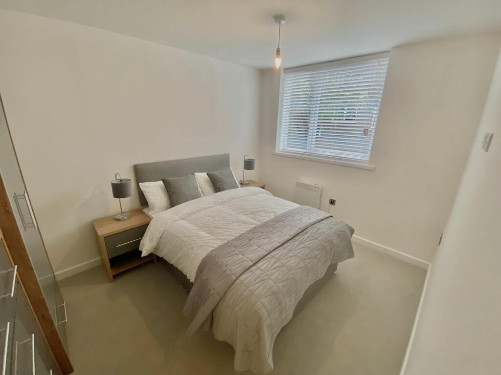 AshleyHouseBedroom.jpg