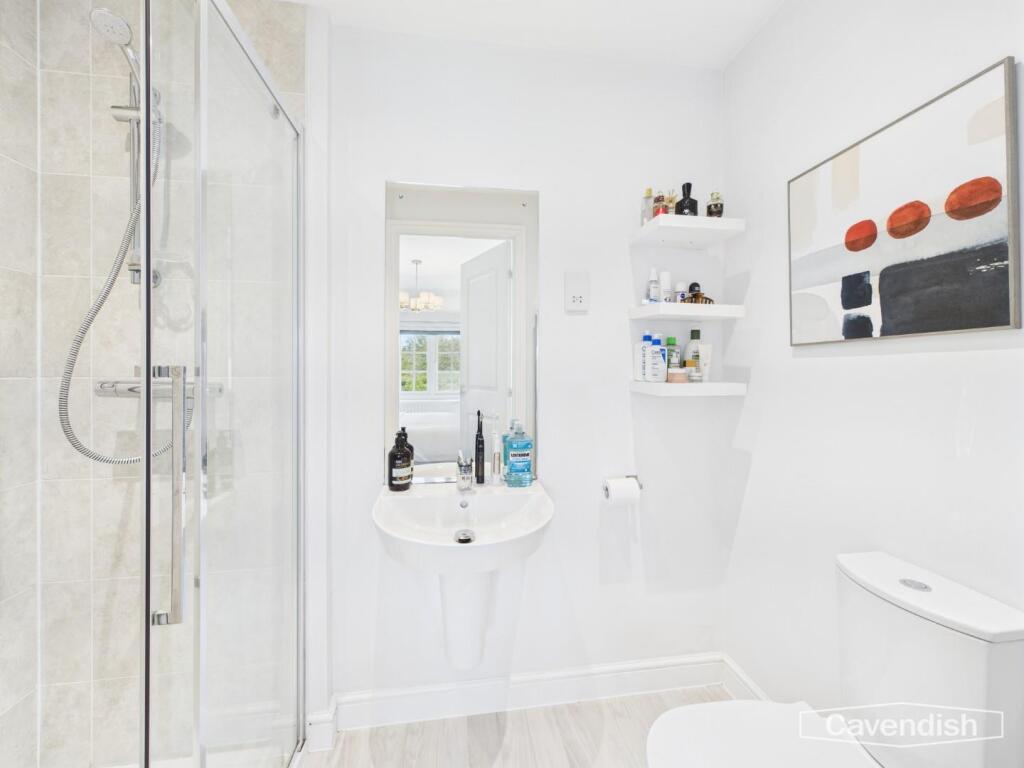 EN-SUITE SHOWER ROOM