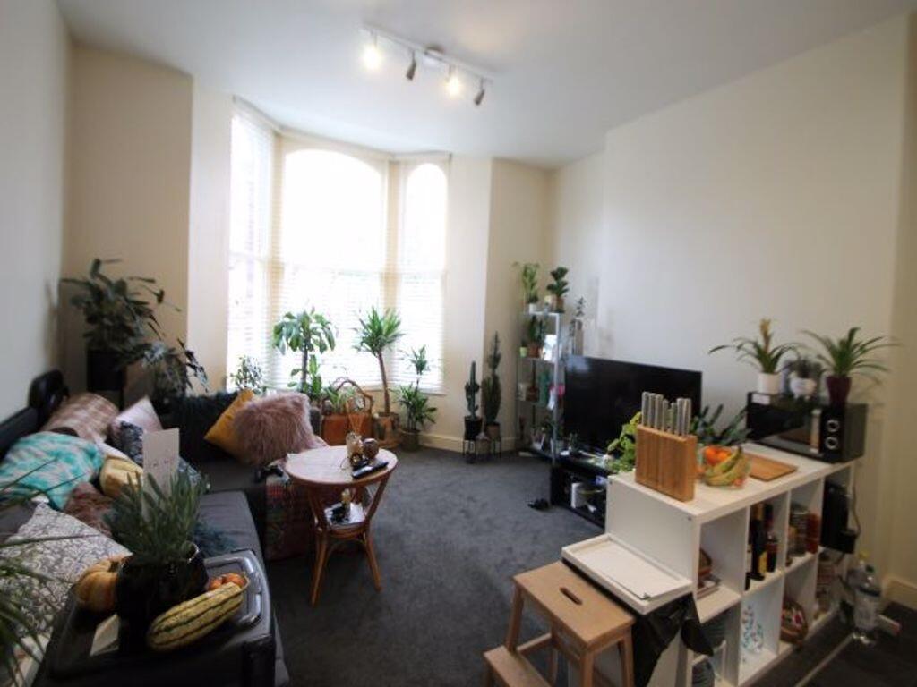 A cozy and inviting living room filled with nat...