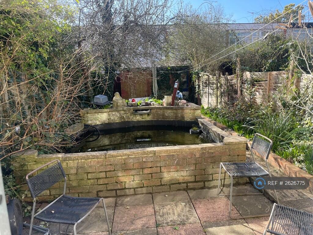 Rear Private Garden With Raised Fish Pond 