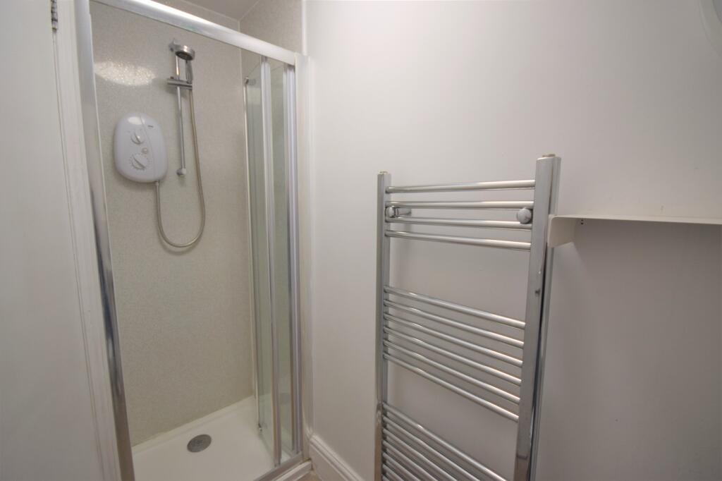 A bright and clean bathroom featuring a modern ...