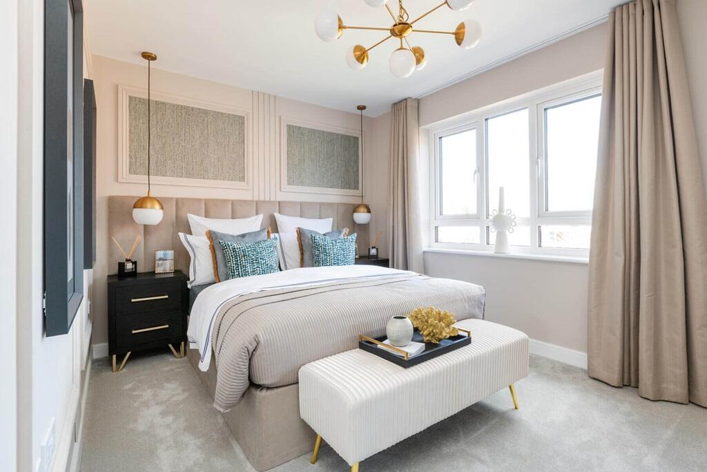 The spacious main bedroom creates space to relax away from the rest of the home
