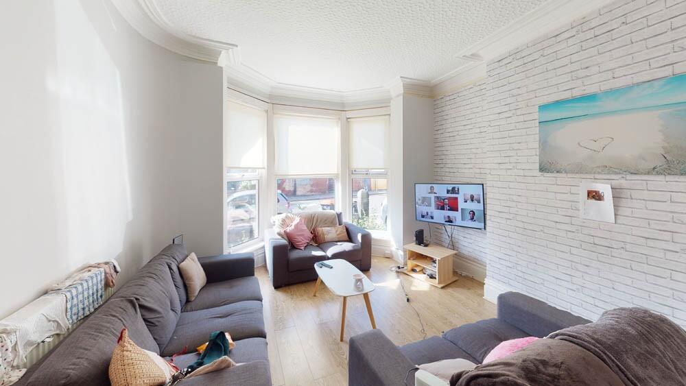 Bright and welcoming living room featuring a sp...