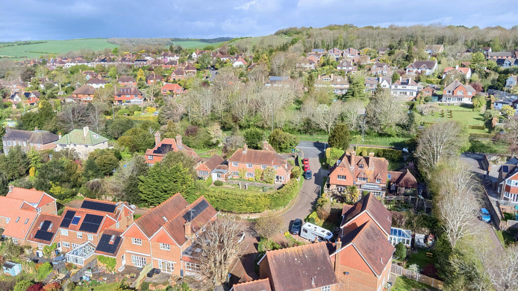 Aerial view of the house and the South Downs in very close proximity