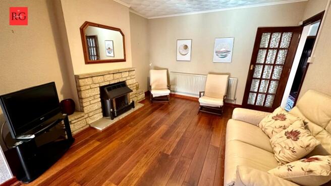A bright and inviting living room featuring pol...