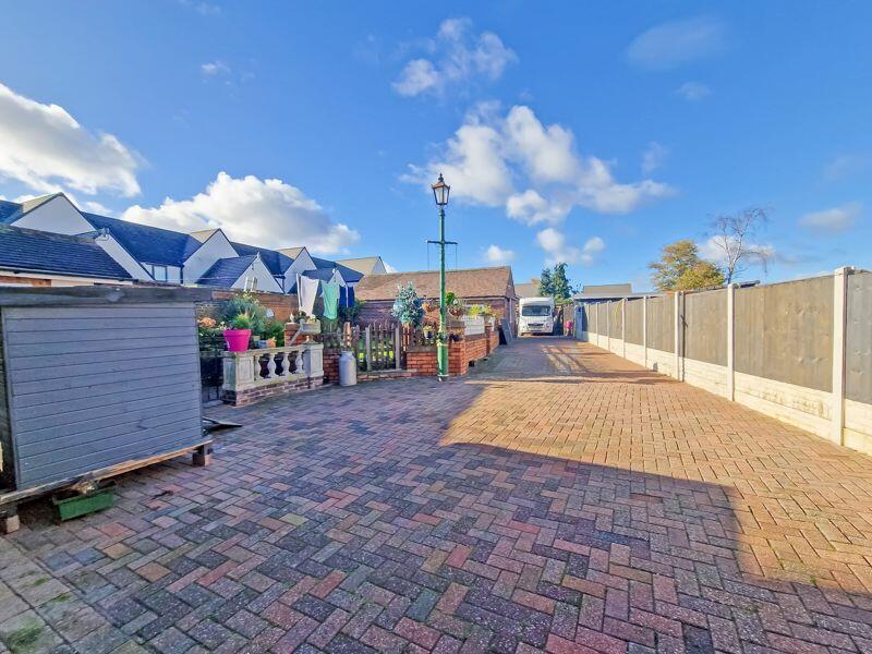 DRIVEWAY AND REAR VIEW