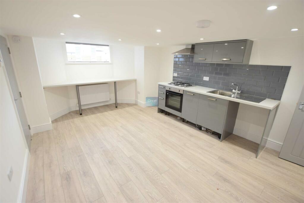 Apt 5 Living Kitchen.JPG