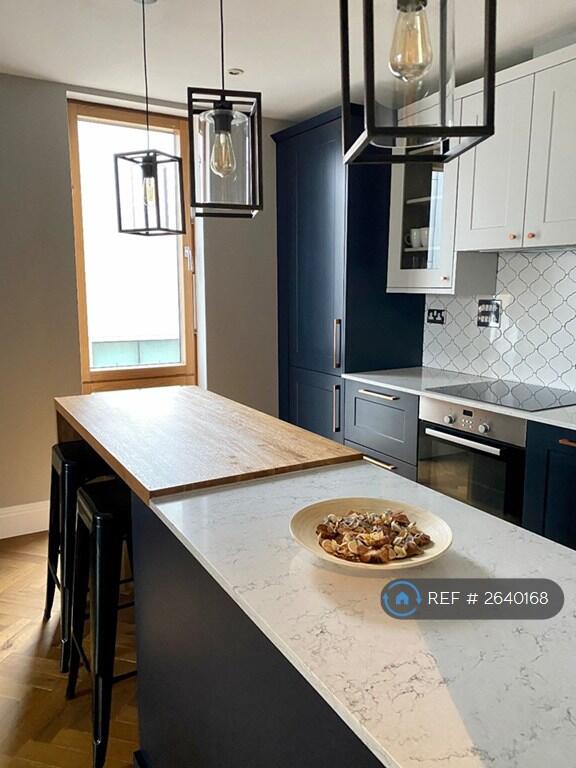 Open Plan Kitchen Dining With Bar Stools