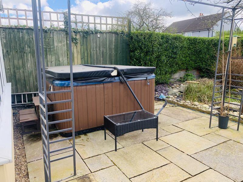 Patio with hot tub