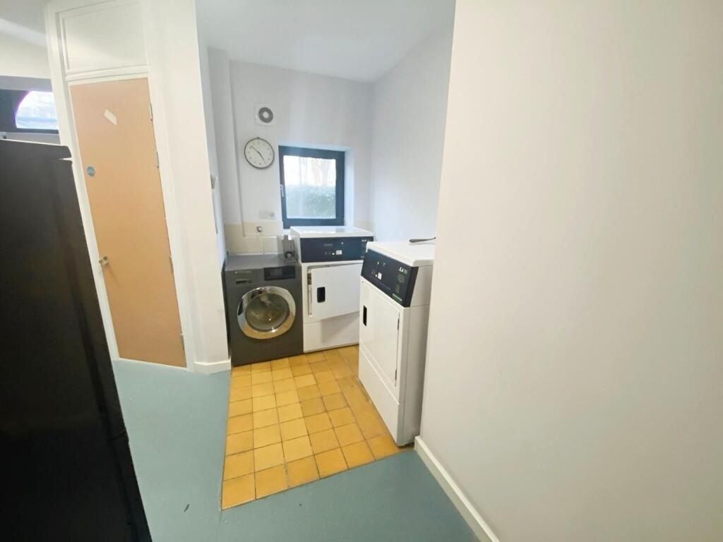 45027068-Communal 20Laundry 20Room.jpg
