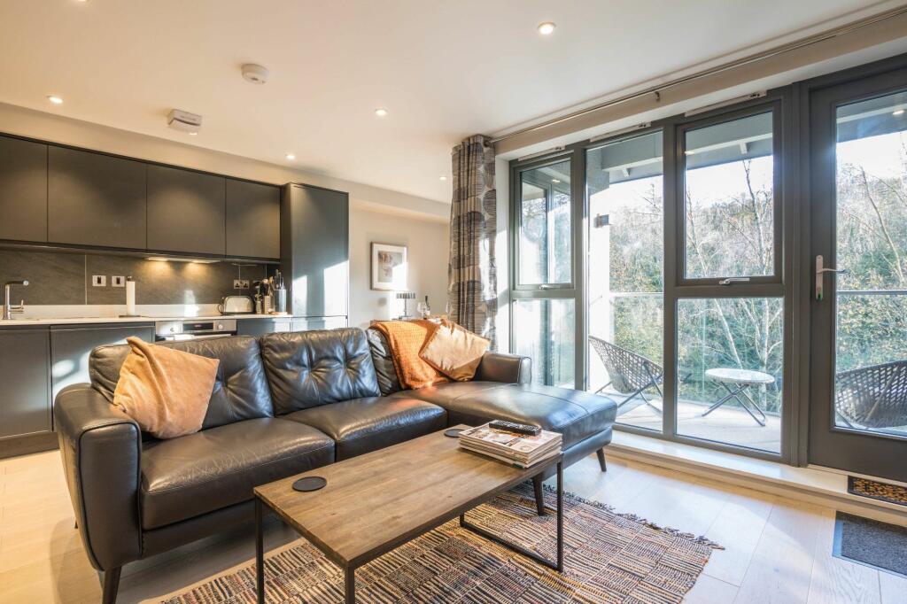 KITCHEN, DINING AND LIVING SPACE