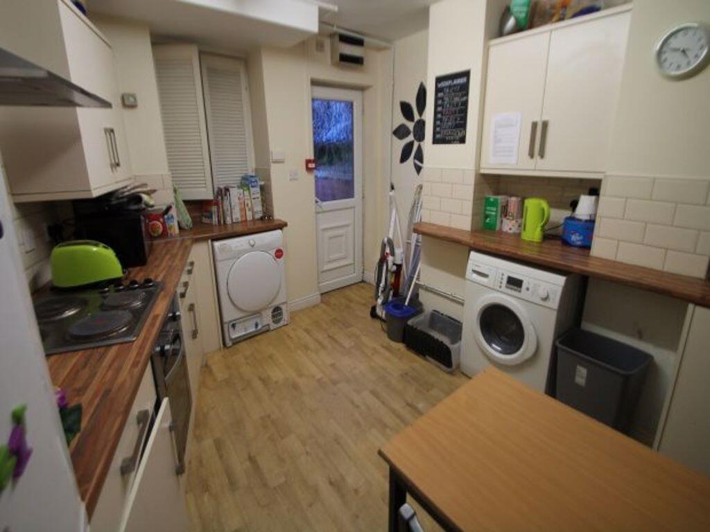 A well-maintained kitchen featuring modern appl...