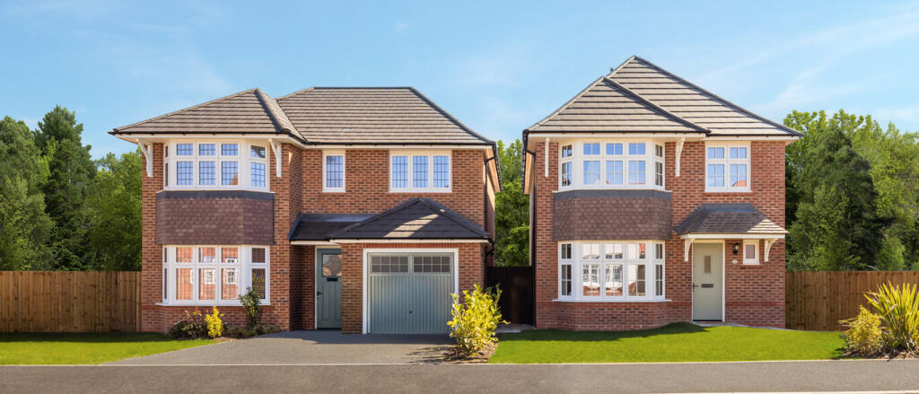 Two modern semi-detached red brick houses with bay windows and grey tiled roofs, situated in a green