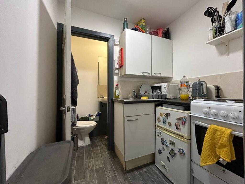 A compact and functional kitchenette perfect fo...