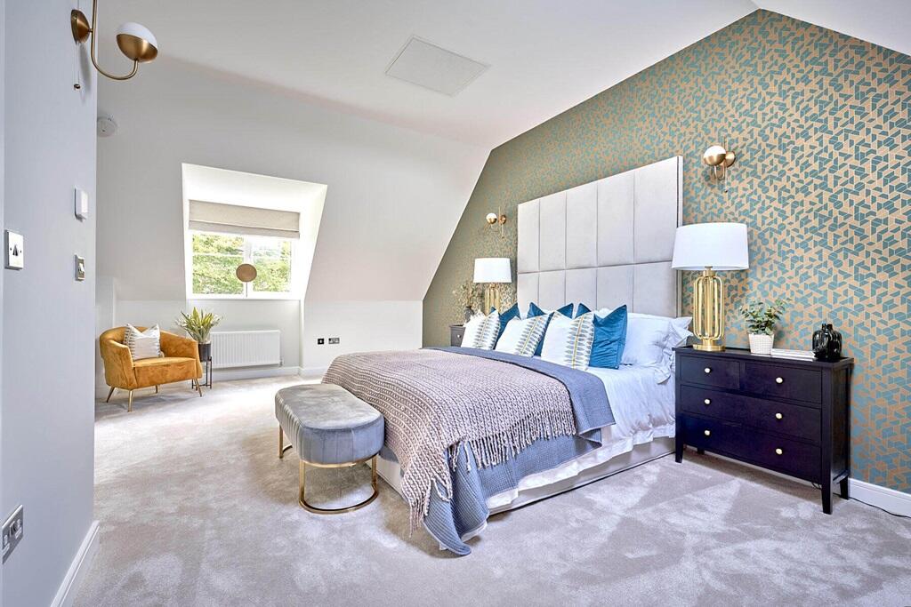 The main bedroom offers plenty of space to unwind away from the rest of the home