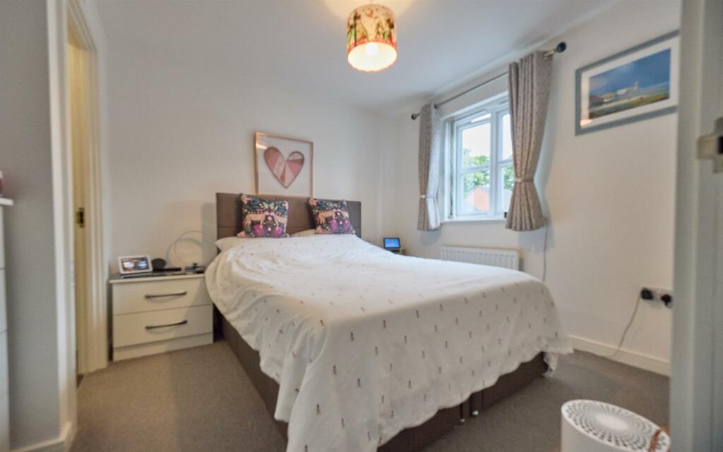 FRONT BEDROOM ONE