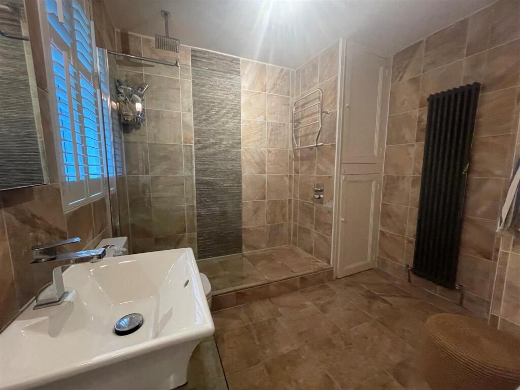 Walk-in shower and fitted bathroom.jpg