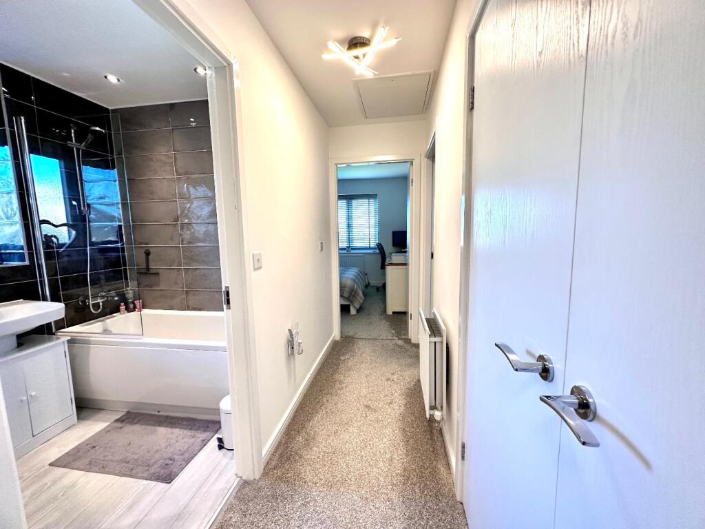 TO THE FIRST FLOOR LANDING