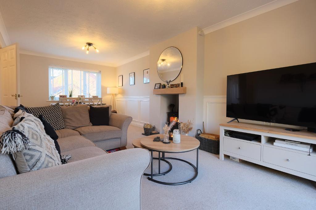 Sitting room and dining area, log burner