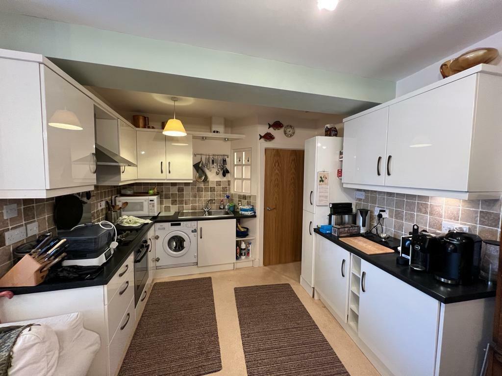 OPEN-PLAN LIVING, DINING AND KITCHEN AREA