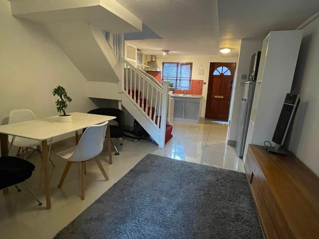 A warm and inviting living area featuring a mod...