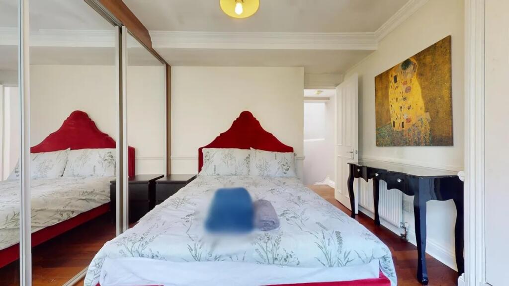 Bright and elegant double bedroom featuring a s...