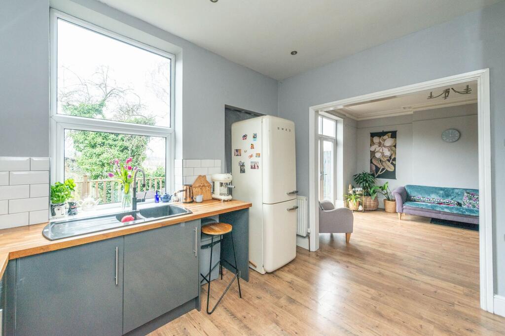 SITTING ROOM AND DINING KITCHEN