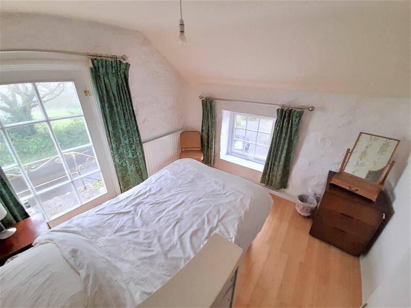 Bedroom with Stone Steps to Courtyard