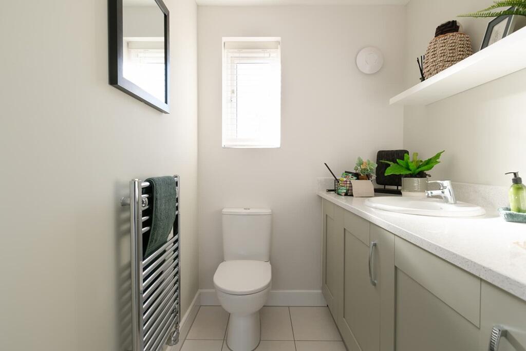 A cloakroom/utility room keeps your laundry out of the kitchen