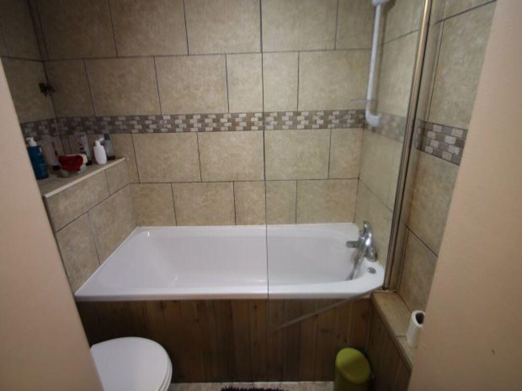 A clean, well-maintained bathroom with a spacio...