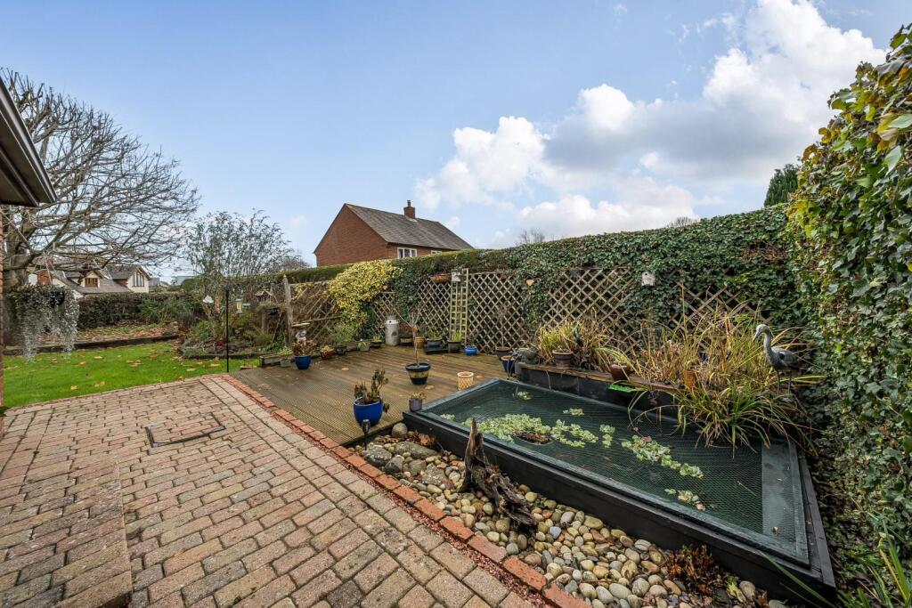 Paved area with pond.jpg