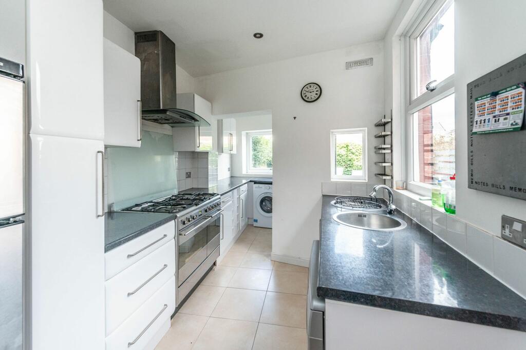 SITTING, DINING ROOM, KITCHEN AND UTILITY