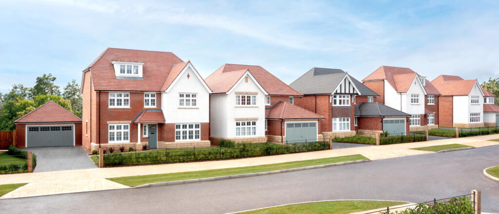A row of modern detached houses with white and brick facades, set in a well-maintained neighbourhood