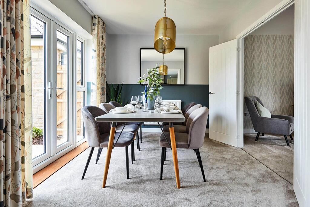 Double doors lead from the lounge to the dining area