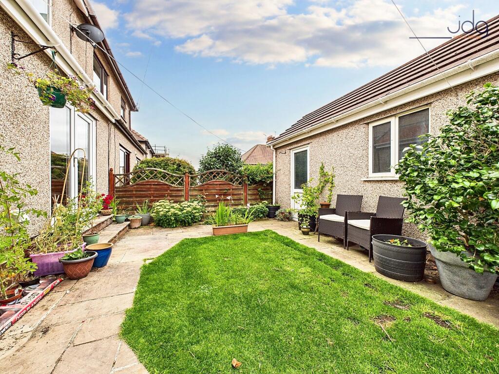 South West Garden with Garage entrance