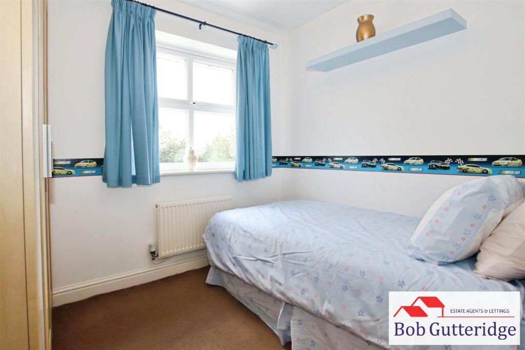 BEDROOM TWO (REAR)