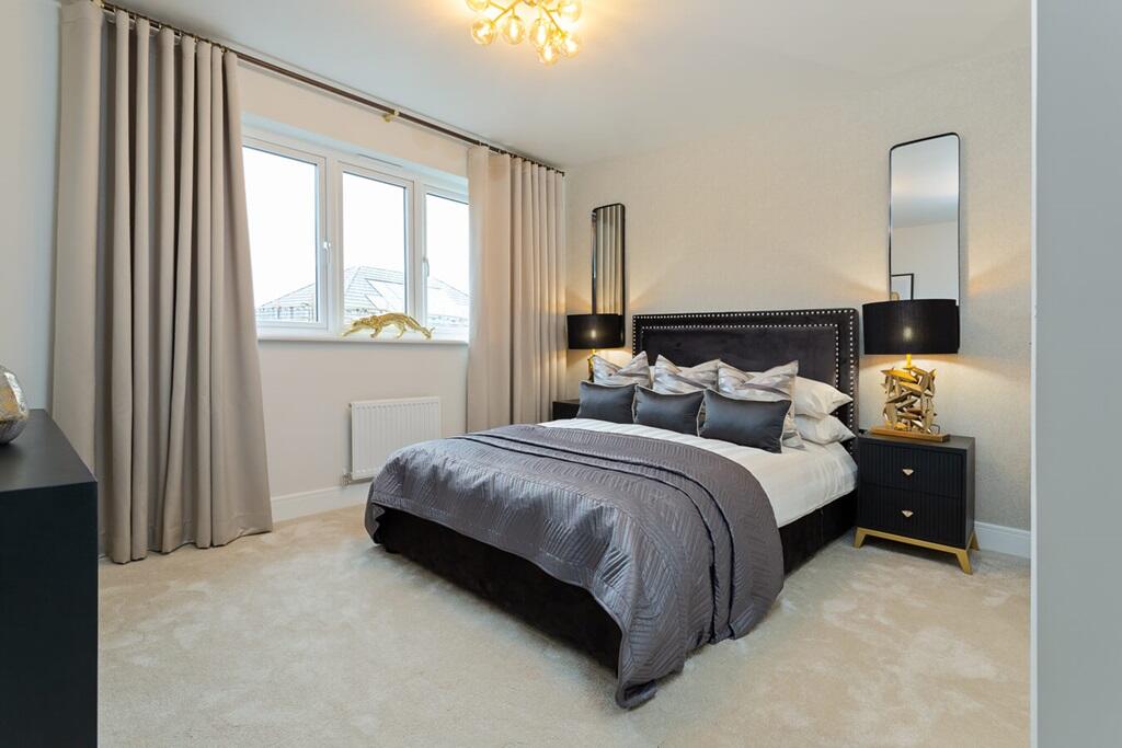 Bedroom two also benefits from having a private en suite