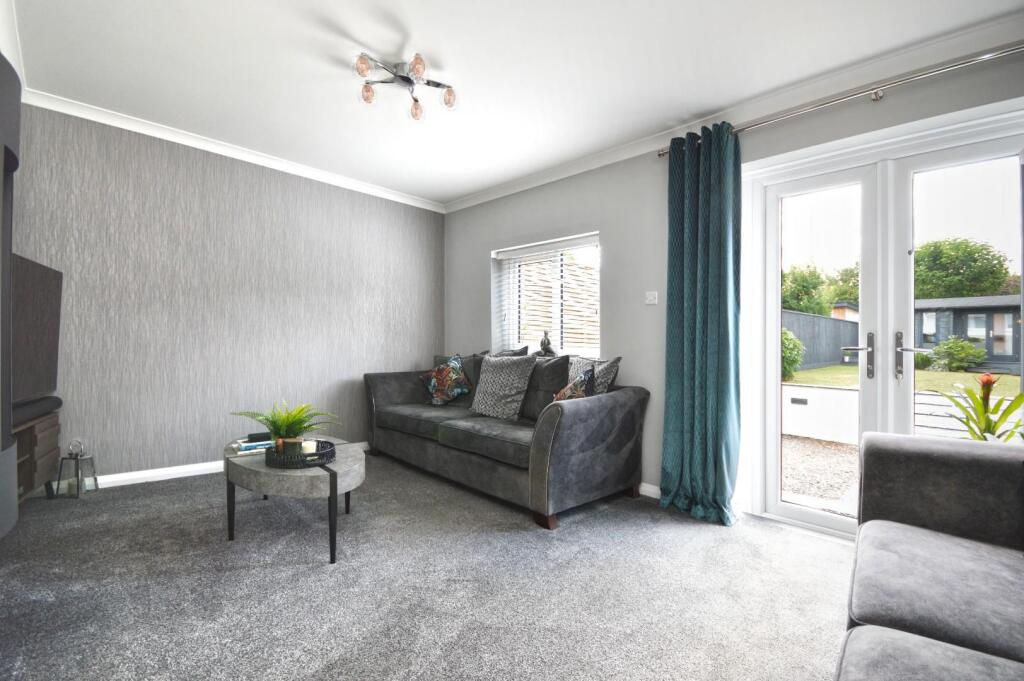 L-Shaped Sitting/Dining Room