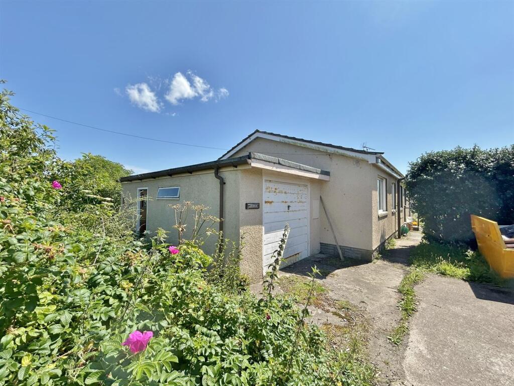 Garage and parking area