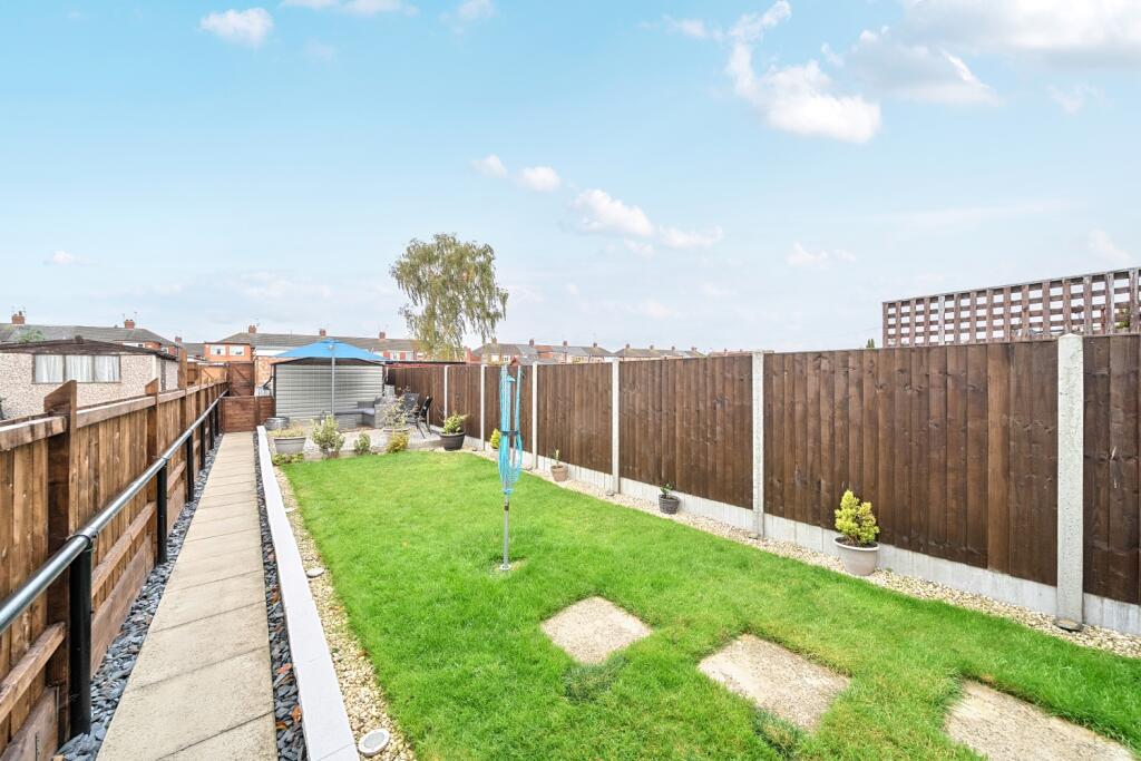 Back garden showing shed and garage