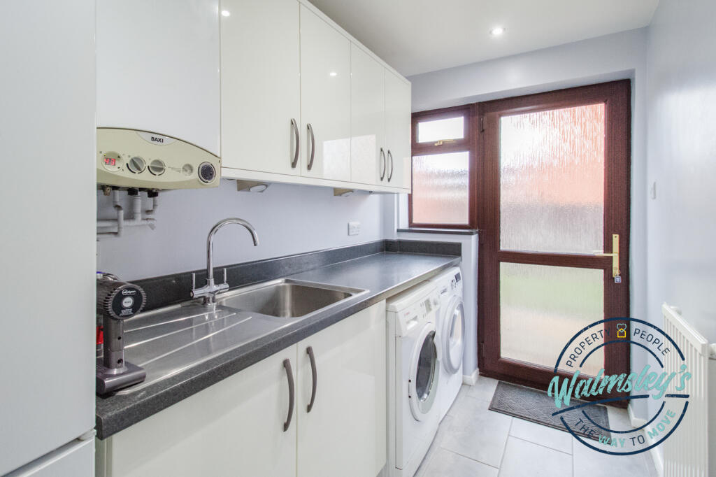Utility room with direct access to integral garage