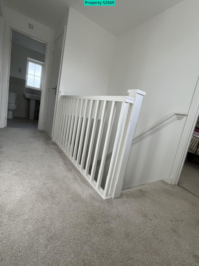 Spacious hall with large storage cupboard