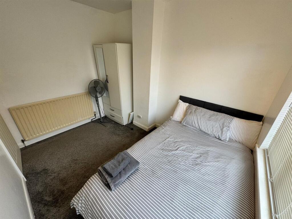 BEDROOM (REAR &amp; FIRST FLOOR)