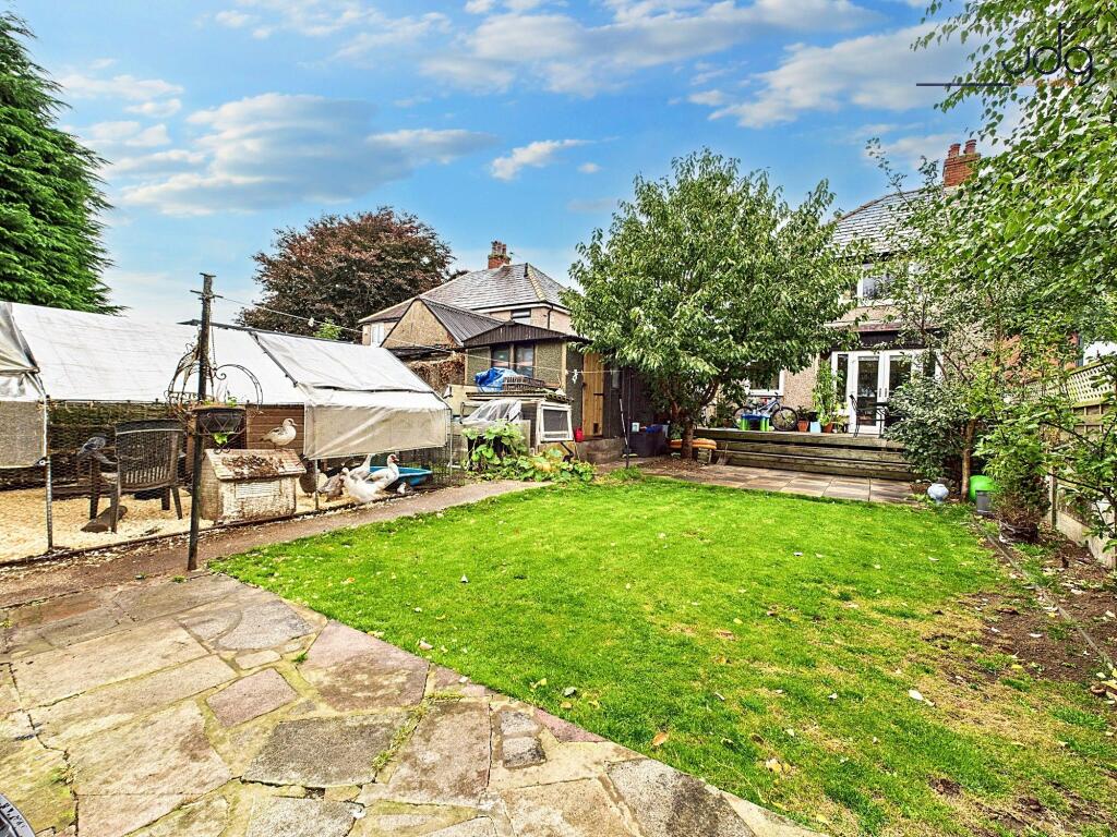 Spacious Garden with mixture of lawn, flags and decking