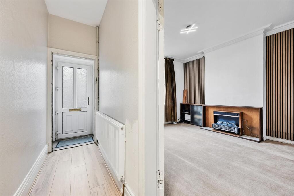 Entrance Hallway and Sitting Room.jpg
