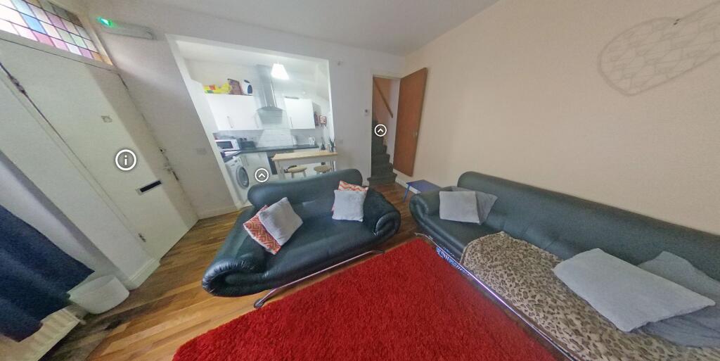 A spacious and well-maintained bathroom with a ...