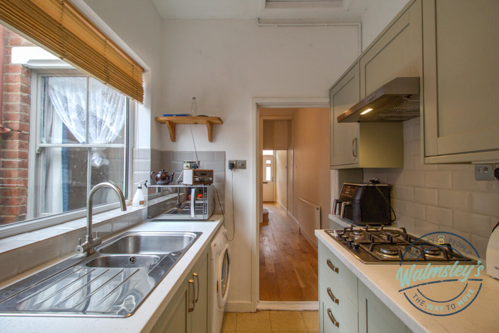 Kitchen towards rear reception