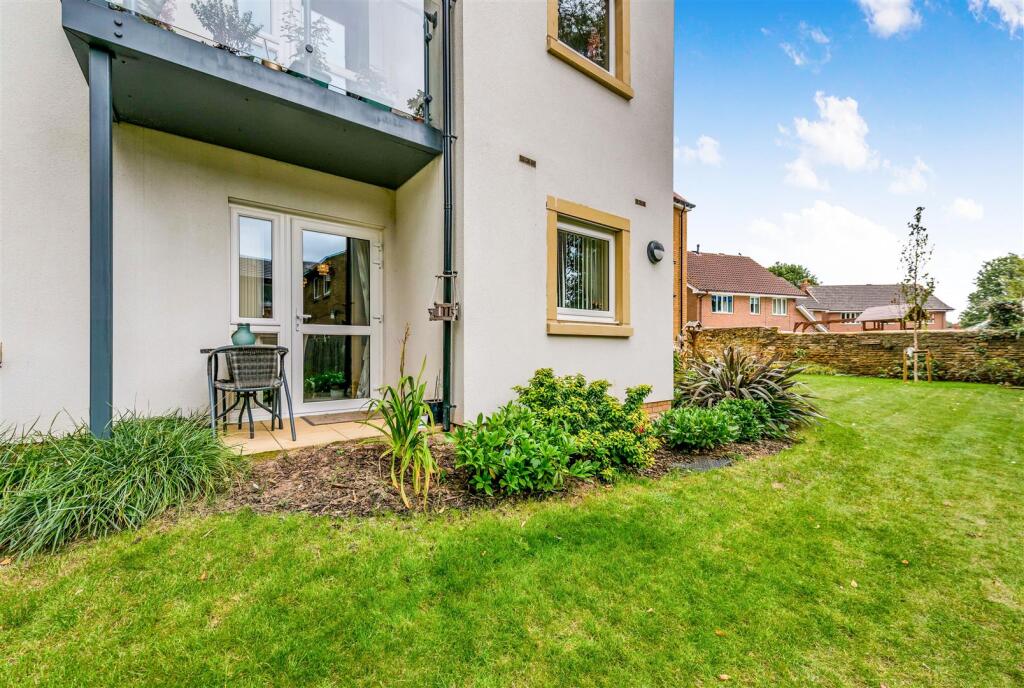 Door from living room to patio and gardens.jpg